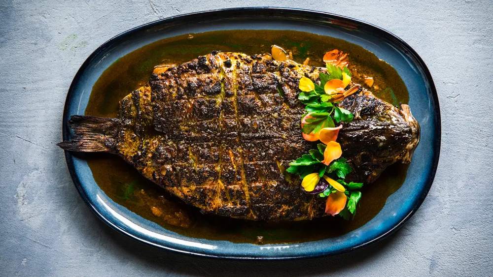 Kann signature dishes Jerk Spiced Mushrooms, Pimento Wood-Grilled Fish